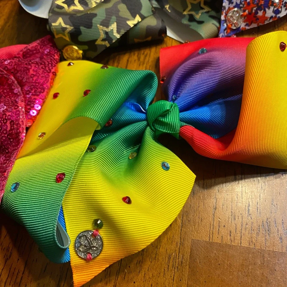 Jo Jo Siwa large cheer hair bows. (4) one ponytail bow, one lol bow